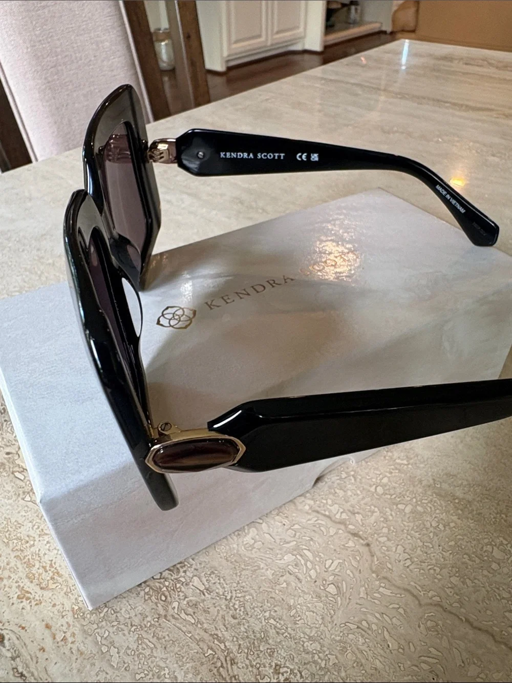 Kendra Scott Black Oversized Square Sunglasses with Pink Lenses